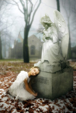 Little Angel looking comfort at the graveyard
